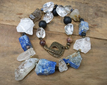 Bold Tribal Statement Necklace wit chunky raw lapis lazuli nuggets, rough quartz crystals, and lava stone