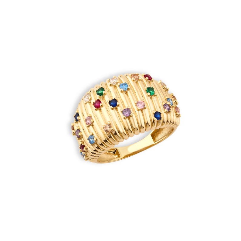 Yellow gold domed ring adorned with multi color cubic zirconia stones displayed on white background.