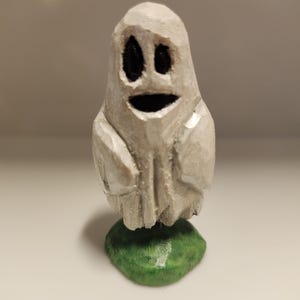 Hand-carved, hand-painted Ghost
