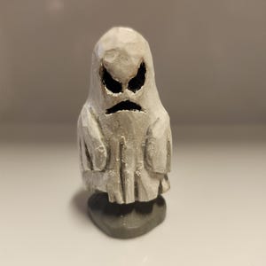 Hand-carved, hand-painted Ghost