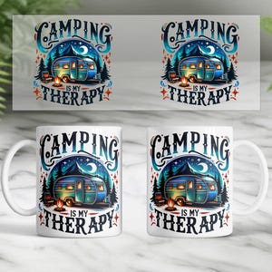 May include: White ceramic mug with a camping-themed design. The design features a blue and green camper under a starry night sky, with the text "Camping is my Therapy". The mug is perfect for enjoying hot beverages.