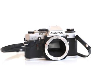 オリンパス OM-10 一眼レフ 35mmフィルムカメラ クロームボディ - Etsy