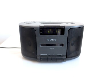 Vintage 1990s sony brand SOUNDESIGN brand portable CASSETTE alarm clock TAPE deck player and power supply -- works perfectly