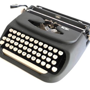vintage 1950s sleek ROYAL brand black & white two tone style vintage TYPEWRITER antique portable manual edition w/ case - works perfectly