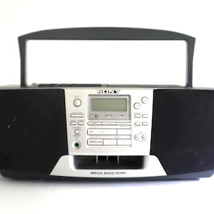 SONY vintage CD/Cassette/A.M. F.M. Radio - battery operated, or cord operated -- FREE shipping U.S.A. -- Tested and working - Free shipping