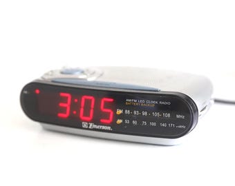 vintage 1980s silver & blue RADIO am/fm ALARM clock -- put the phone to bed -- Tested and working