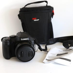 vintage LUMIX panasonic DC-FZ80 black and white DIGITAL camera with two batteries, charger, manual and case -- tested and working!
