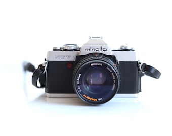 vintage SLR 1950s MINOLTA XG-7 Manual Single Lens Reflex camera w/ extra lens, strap, flash, and manual -- great condition