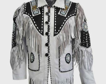 May include: White leather jacket with black detailing, fringe, and beadwork. The jacket has a traditional collar, button closure, and intricate stitching. The sleeves and chest are decorated with fringe.