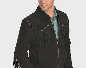 May include: Black suede jacket with fringe detailing across the chest and sleeves. The jacket features a zip-up front, a collar, and decorative metal accents. A classic Western-inspired design.