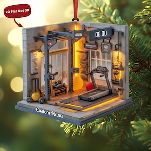 May include: A miniature gym ornament featuring a treadmill, weight rack, and exercise ball. The ornament has a grey and brown colour scheme, with the text "Custom Name" on the base. The clock displays 06:00. The ornament is labelled "2D Flat Not 3D".