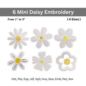 Może przedstawiać: Sześć białych haftowanych wzorów stokrotek w czterech rozmiarach, od 2,5 do 7,5 cm.