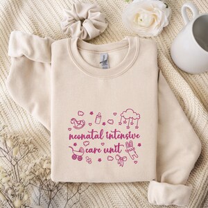 Embroidered NICU Nurse Shirt,  Neonatal Intensive Care Unit Nurse Sweatshirt, Coquette Nurse Shirt, Nicu Nurse Gifts, Nicu Graduate Gift