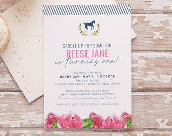 May include: A party invitation with the text "Saddle up for some fun, Reese Jane is turning one!" The invitation has a horse graphic, floral accents, and a striped border. Cupcakes and an envelope are in the background.