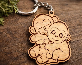 Llavero de madera con monos abrazándose (archivo para corte láser, SVG, DXF, AI)
