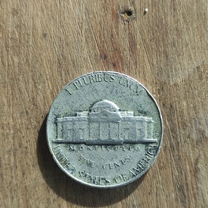 Jefferson nickel 1964 d error coin