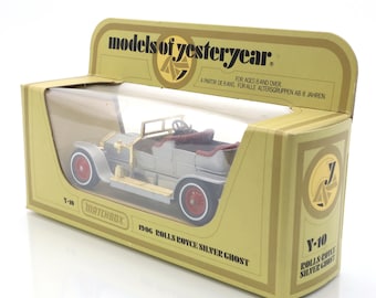 Four Corgi Classics cars, comprising a No. 9041 1912 Rolls-Royce Silver