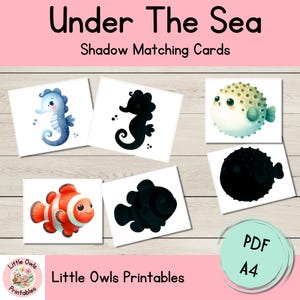 Könnte beinhalten: Ein Satz bedruckbarer Schatten-Zuordnungs-Karten mit Unterwassertieren. Die Karten zeigen ein blaues Seepferdchen, einen Clownfisch und einen Kugelfisch. Die Karten sind so konzipiert, dass Kinder die Tiere mit ihren Schatten zusammenbringen können.
