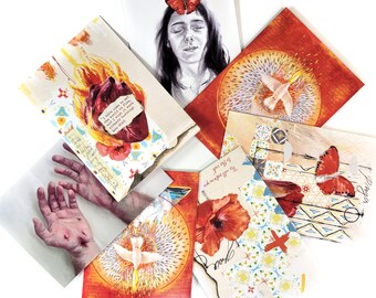 May include: A collection of six colorful cards with various designs. The cards feature a butterfly, a bird, a heart, and a floral pattern. The cards are arranged in a star shape on a white background.