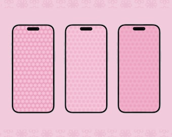 May include: Three black smartphones with pink patterned backgrounds. The phones are arranged in a row on a pink background with a repeating pattern of pink flowers.