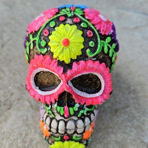 Mexican day of the dead sugar skull with colorful flowers, hand painted, Mexican folk art, dia de muertos calavera