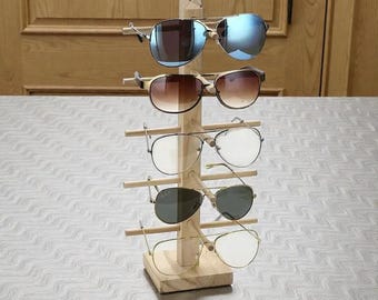 Expositor de gafas de sol de madera multicapa, organizador para varios pares y soporte para joyas.