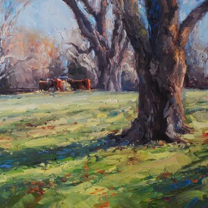 Feeding Time, 11x14, oil. Painting of cows in a field with old trees in the wintertime. image 1