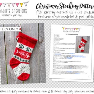 May include: A red and white knitted Christmas stocking with a fish skeleton and paw print design. The stocking measures 8 inches wide and 15 inches long. The pattern is available as a PDF download.
