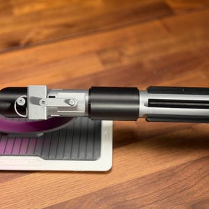 May include: A rustic wooden sign with the text "Welcome to our home" in a handwritten style. The sign has a distressed finish and a simple, inviting design, suitable for a front porch or entryway.