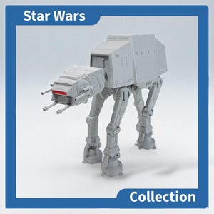 May include: A light gray AT-AT model from Star Wars. The model has a detailed design with multiple legs, a central body, and a head with red accents. The image includes the text "Star Wars" and "Collection".