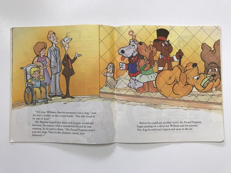 May include: A family visits a dog pound. The father, mother, and son are looking at a group of dogs behind a fence. The dogs are performing tricks. The text reads, "It's true, William, that we promised you a dog." and "Before he could say another word, the Pound Puppies began putting on a show for William and his parents. The dogs howled and yipped and spun in the air."
