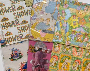 May include: Assortment of six vintage baby shower wrapping paper designs. The papers feature a variety of patterns, including a yellow elephant, a blue hippopotamus, a train with babies, a baby under an umbrella, and a pink elephant with a floral bouquet. The papers are all in shades of yellow, blue, pink, and green.
