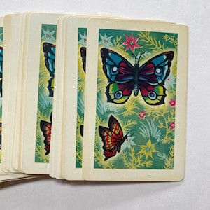 Jeu de cartes complet, motif papillon groovy joué sans jokers