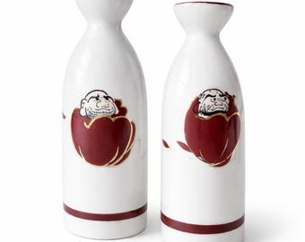Par de botellas de sake japonesas vintage Tokkuri Daruma de porcelana de 18 cm.