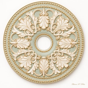 May include: A circular ceiling medallion featuring a pale sage green center with a central hole. The surface is decorated with raised white acanthus leaf carvings, gold-toned beaded borders, and a textured lattice pattern along the outer edge.