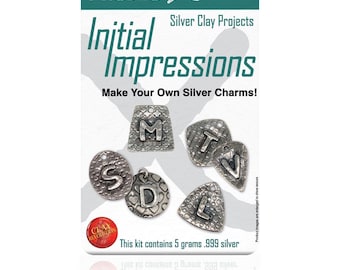 May include: Five Star ProjectX Initial Impressions Silver Clay Projects kit with 5 grams of .999 silver. The kit includes five silver charms with letters M, T, S, D, and L.