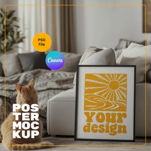 May include: A black framed poster with a yellow sun and hills design. The text "Your design" is printed in a retro font on the poster.