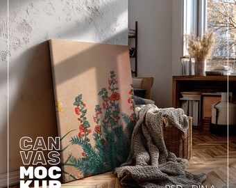 May include: A canvas mockup featuring a floral print with red and white flowers and green leaves. The canvas is leaning against a white wall and a wooden floor. The text "CANVAS MOCKUP" is visible in the lower left corner.
