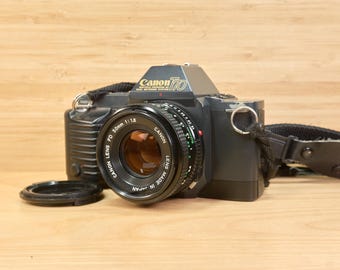 Canon T70 35mm SLR Film Camera Set: 50mm f1.8 Lens & Flash