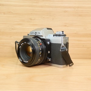 Vintage Minolta XG-M 35 mm SLR-filmcamera / 50 mm f/2 MD-lens / Made in Japan / Getest