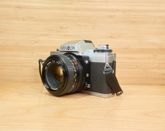 Vintage Minolta XG-M 35mm Film Camera: 50mm f/2 Lens, Made in Japan