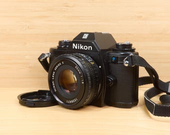 ヴィンテージ Nikon EM 50 mm シリーズ e 1:1,8 レンズ 日本製フィルム