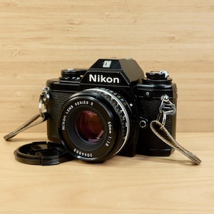 Vintage Nikon EM 35mm SLR Film Camera / Nikon E 50mm f/1.8 Lens / Nikon SB-E Flash / Tested & Working