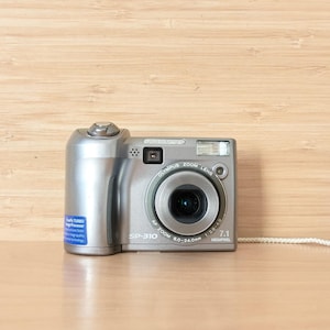 Olympus SP-310 Digital Camera Silver 7.1MP 3x Optical Zoom Vintage Compact