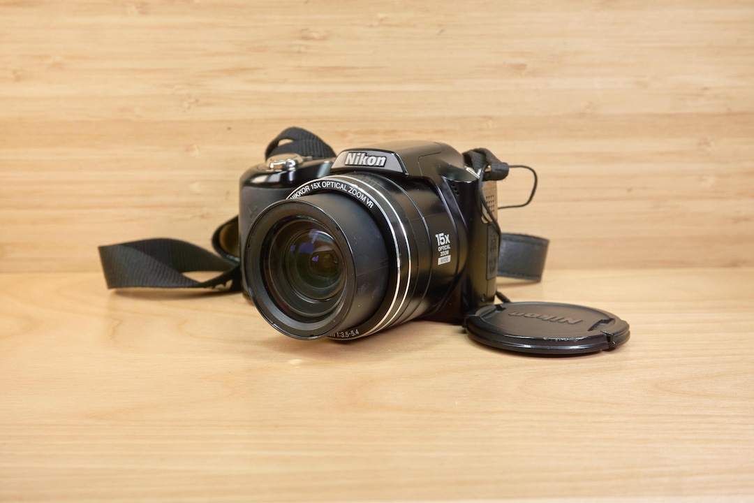 Nikon Coolpix L100 Noir – Appareil Photo Bridge 10 Mpix, Zoom 15x, état Fonctionnel
