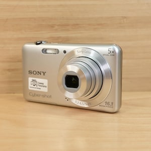 Vintage Sony Cyber-Shot DSC-W710 16.1MP Digital Camera / 5x Optical Zoom / Silver / Tested & Working
