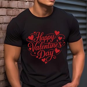 May include: Black t-shirt with a red Valentine's Day design. The design features the text "Happy Valentine's Day" in a decorative script, surrounded by red hearts and stars.