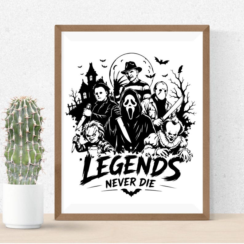 May include: A framed black and white art print featuring iconic horror movie characters including a masked figure, a doll, and a clown, with a haunted house and moon in the background. The text "LEGENDS NEVER DIE" is printed at the bottom.