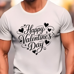 May include: White t-shirt with a black heart-shaped design that reads "Happy Valentine's Day" in a decorative script. The design includes small hearts and stars. The shirt is a crew neck style.