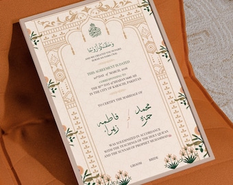 May include: A framed Islamic marriage certificate with cream-colored paper, featuring intricate gold and green floral borders, Arabic calligraphy, and English text detailing a marriage agreement dated March 10, 2026, in Karachi, Pakistan.